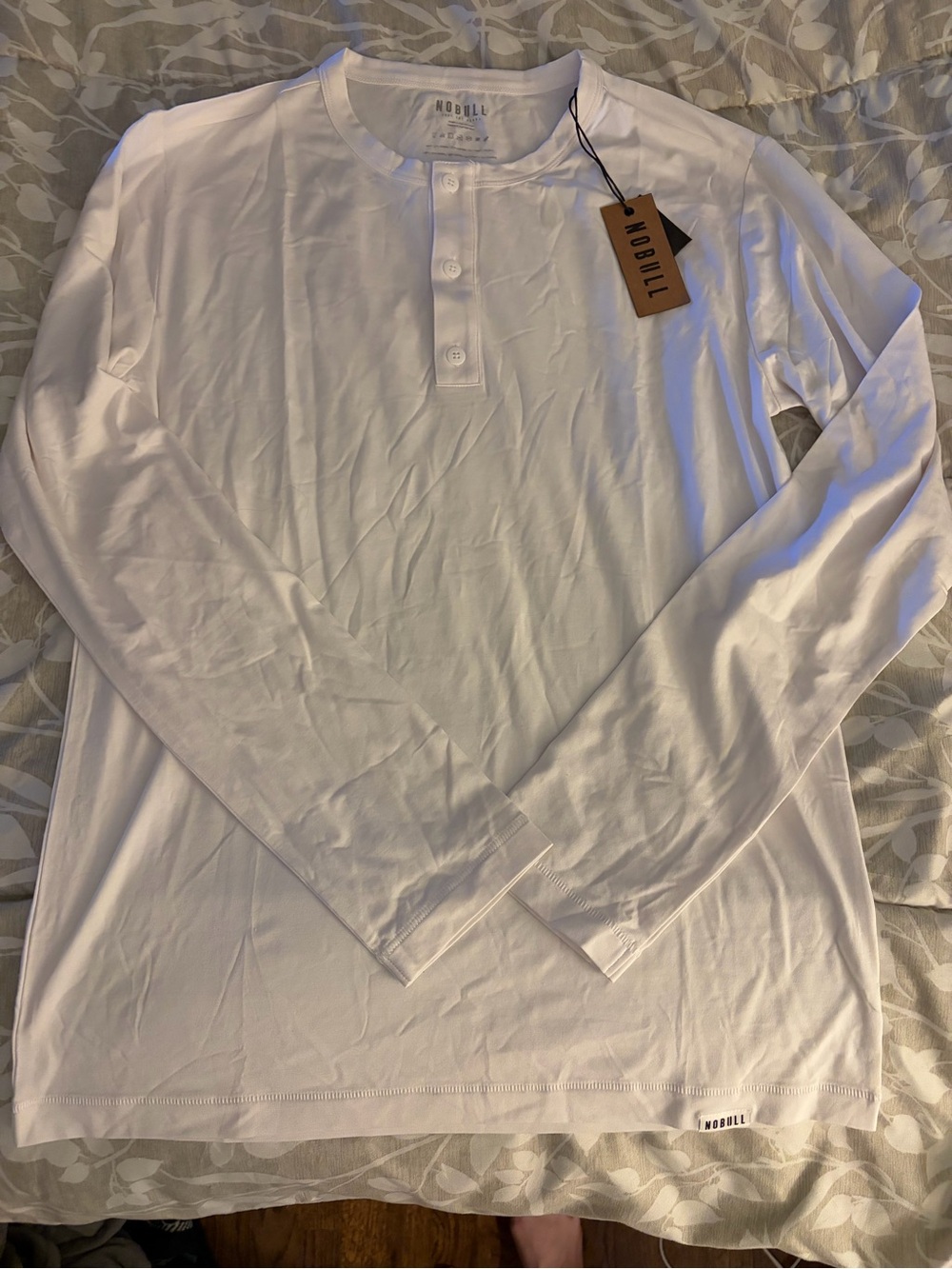 NOBULL Men's White Long-Sleeve Henley Shirt with Button Placket